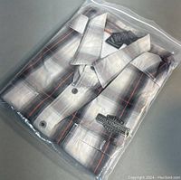 Folded Harley-Davidson men's plaid shirt in original packaging
