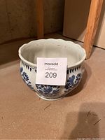 Top view showing interior and scalloped edge of the ceramic pot