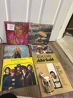 Six vinyl record albums photo showing Rod Stewart Greatest, Supertramp, Elton John, Beach Boys 20 Greatest Hits, CKLW Solid Gold, Frankie Yankovic Greatest Hits covers.