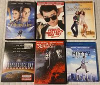 Front view of six movie cases: The Cutting Edge, Ferris Bueller's Day Off, Ice Princess, Independence Day Resurgence, 30 Days of Night, and The Secret Life of Walter Mitty.