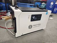 Front and side view powered on showing digital display at 40% humidity