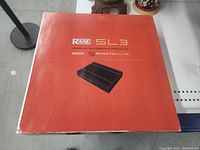 Front view of the original Rane SL3 product box in good condition with some edge wear. The box is red with white text and a product illustration.