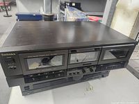 Full view of the Technics dual cassette deck showing both compartments and front controls.