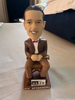 Front view of the Bix Beiderbecke bobble head showing the facial details, outfit, and base.