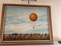 Overall view of framed oil painting showing crowd and balloon
