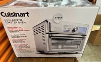 Box of Cuisinart Digital Air Fryer Toaster Oven showing model and digital features
