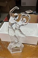 Clear Italian glass sculpture of a dancing couple on hexagonal base taken out of box