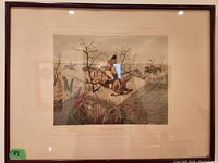 Framed colored print showing a traditional fox hunting scene titled "Charging a Park Fence".