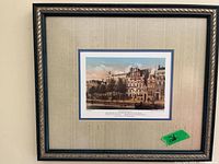 Framed print showing Keizergracht canal scene with Dutch buildings and trees along the water.