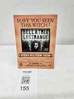 Image of front of Bellatrix Lestrange reward poster with text and character photo.
