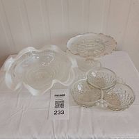 Overview of three Hobnail Fenton glass pieces including ruffled bowl, pedestal cake stand, and divided dish