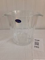 Front view of the clear crystal ice bucket with Royal Doulton label visible