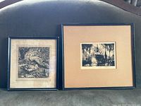 Both framed etchings together showing scale and frames