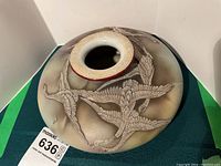 Top view of Nippon ceramic bowl showing flying swan figures attached and decorative rim