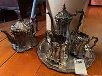 Full set arranged on tray and floor