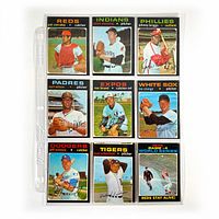 Nine 1971 O-Pee-Chee baseball cards in a clear plastic binder sleeve, showing front face images of players and one World Series card.