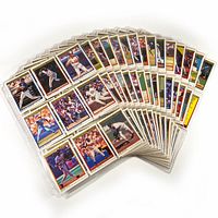 Array of individually sleeved 1991 O-Pee-Chee baseball cards fanned out showing front images of players in action or batting.