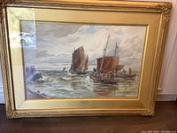 Full view of framed watercolor painting showing boats at sea