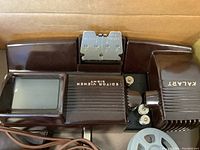 Top view of Kalart 8mm editor viewer showing screen, film clip, and attached film reel