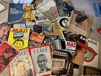Overview photo showing a collection of vintage magazines including Time, Mad Magazine, Esquire, Newsweek, Century and Castaline, plus the Westinghouse brochure