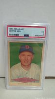 Front view of 1954 George Kell baseball card in PSA graded slab showing grade VG 3.
