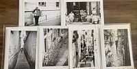 Photo showing all six black and white photography greeting cards arranged in two rows with urban scenes including streets, alleys, and people.