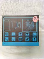 Box side showing camera icons and features including PoE, 12V 200mA, privacy mask, sensors and remote access compatibility.