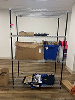 Front view of assembled unit with removable items on shelves