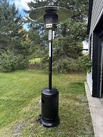 Front view of assembled patio heater outdoors
