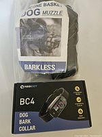 Original packaging of Barkless silicone dog basket muzzle and ABBIDOT BC4 dog bark collar box.