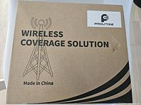 Box front with 'Wireless Coverage Solution' printed and PROUTONE logo