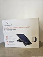 Front of the packaging box showing the Wasserstein solar panel with EufyCam E compatibility, features icons for eco-friendly, 360-degree rotatable bracket, quick installation, and weather-resistant.
