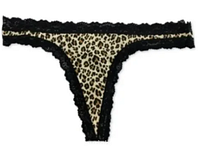 Front view of a women's thong with nude fabric and wild leopard print, trimmed with black lace on the waistband and edges.