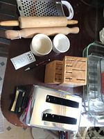 Photo showing all items together including toaster, utensil block, rolling pins, ramekins, and knife