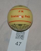 Training ball showing 'J R Training Ball' and angle scale markings