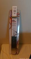 Front-view photo of the new 14 inch magnetic kitchen utensils rack sealed in its original packaging with visible branding and product label.