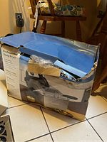 Original packaging box for the Waring Pro Professional Deep Fryer showing some wear and tear.