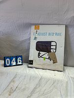 Retail box showing Stander EZ Adjust Bed Rail product image and branding