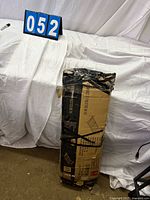 Full view of unopened taped box showing size of package