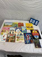 All 14 books laid out