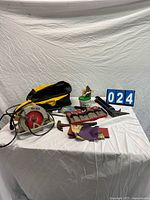 Group view of all items including circular saw, bag, hand tools and accessories