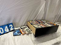 Entire drawer of DVD cases with lot number card