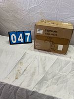 Closed box labeled Homever Slow Juicer