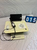 Printer with power adapter, cable and CD displayed