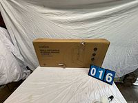 Front view of unopened Ivation ironing board cabinet box
