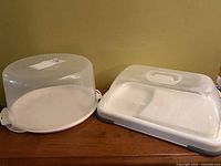 Round and rectangular cake carriers side by side
