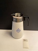 Full view of Corning Ware Cornflower 9-cup carafe with lid and handle