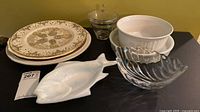 All pieces grouped: fish dish, plates, glass bowls, casserole dish
