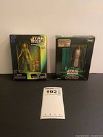 Both boxed Star Wars figures displayed together