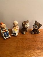 All four ceramic shakers shown together